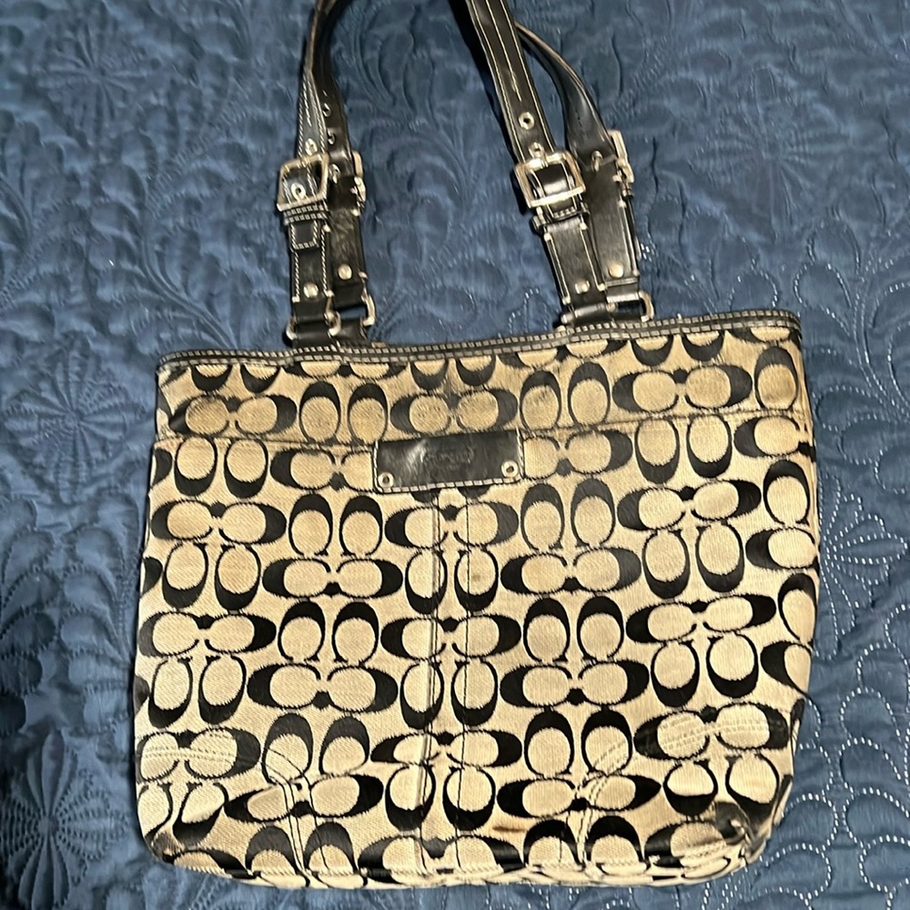 (#13) Coach hand bag.